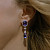 Earrings with tanzanites and diamonds