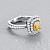 Ring with yellow diamond and diamonds