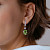 Earrings with peridots and diamonds