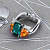 Ring with indigolite, spessartines and diamonds