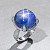 Ring with star sapphire and diamonds
