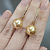 Earrings with golden South Sea pearls and diamonds
