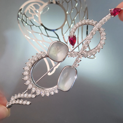 Brooch with rubies, moonstones and diamonds