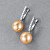 Earrings with golden South Sea pearls and diamonds