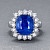 Ring with blue sapphire and diamonds
