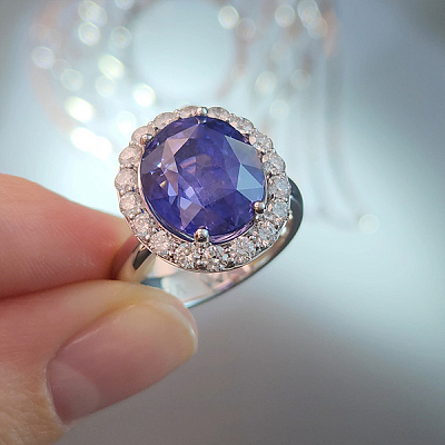 Ring with color change sapphire and diamonds