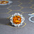 Ring with yellow sapphire and diamonds