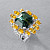 Ring with teal sapphires, yellow sapphires, and diamonds