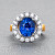 Ring with blue sapphire and diamonds