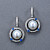 Earrings with South Sea pearls, blue sapphires, and diamonds