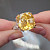 Ring with yellow sapphire and diamonds