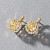 Earrings with yellow sapphires and diamonds